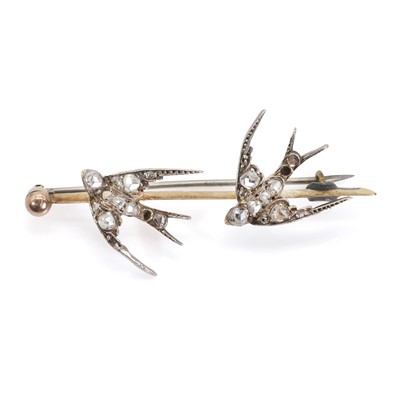 Lot 15 - A Victorian rose cut diamond swallow brooch