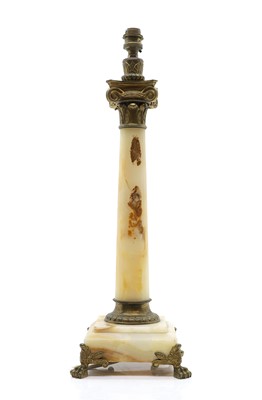 Lot 671 - An alabaster oil lamp column