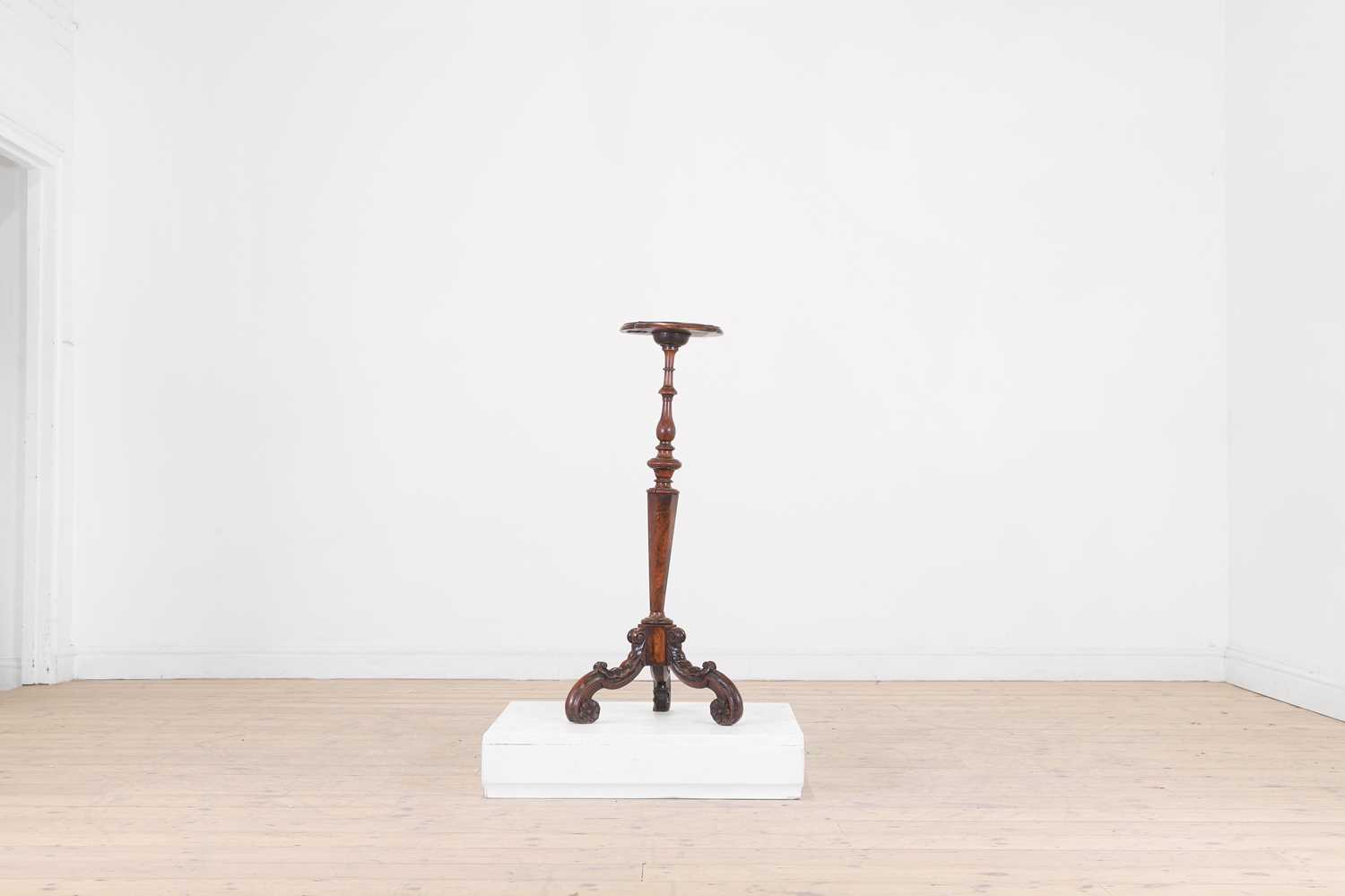 Lot 5 - A walnut candle stand