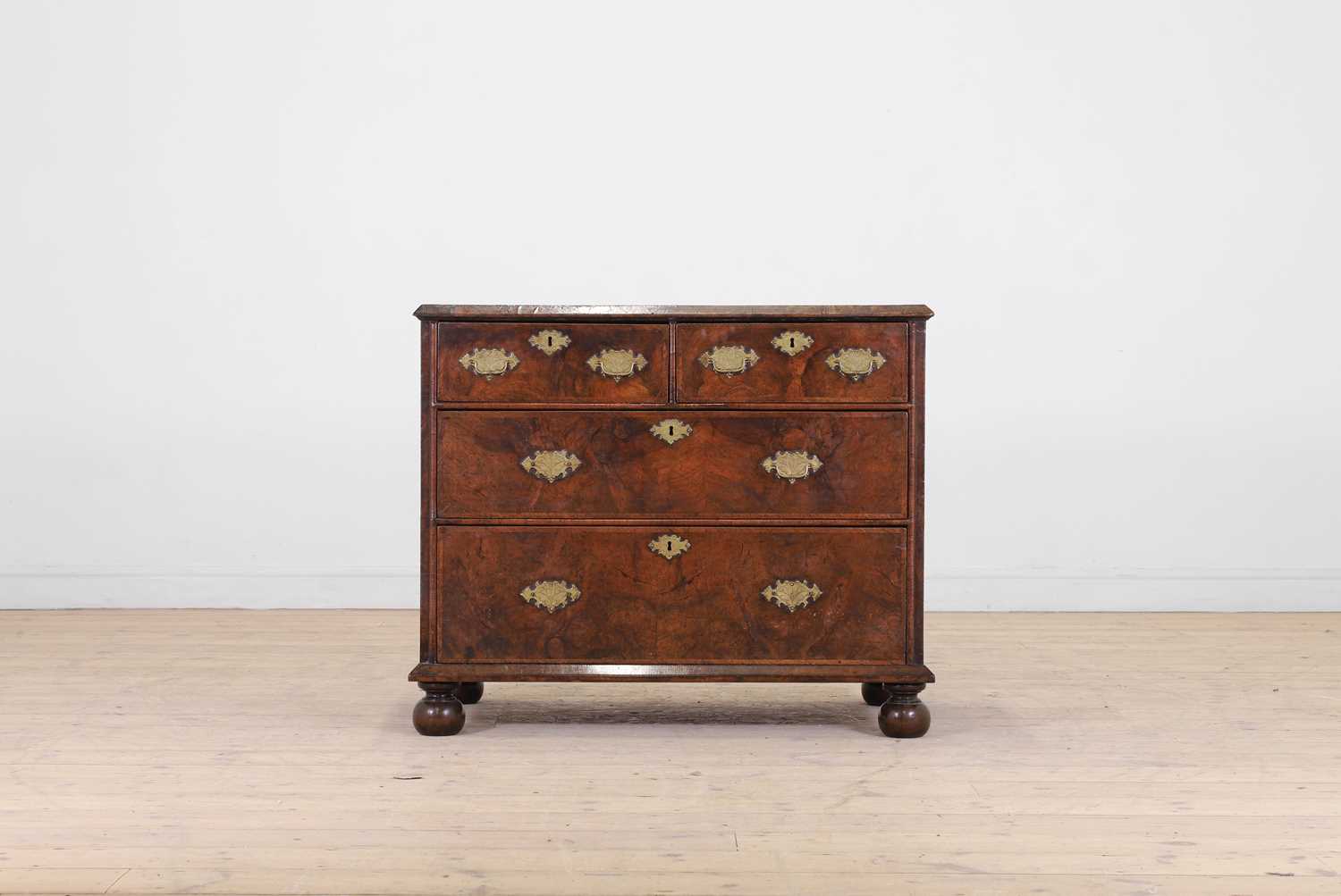 Lot 4 - A William and Mary walnut chest of drawers