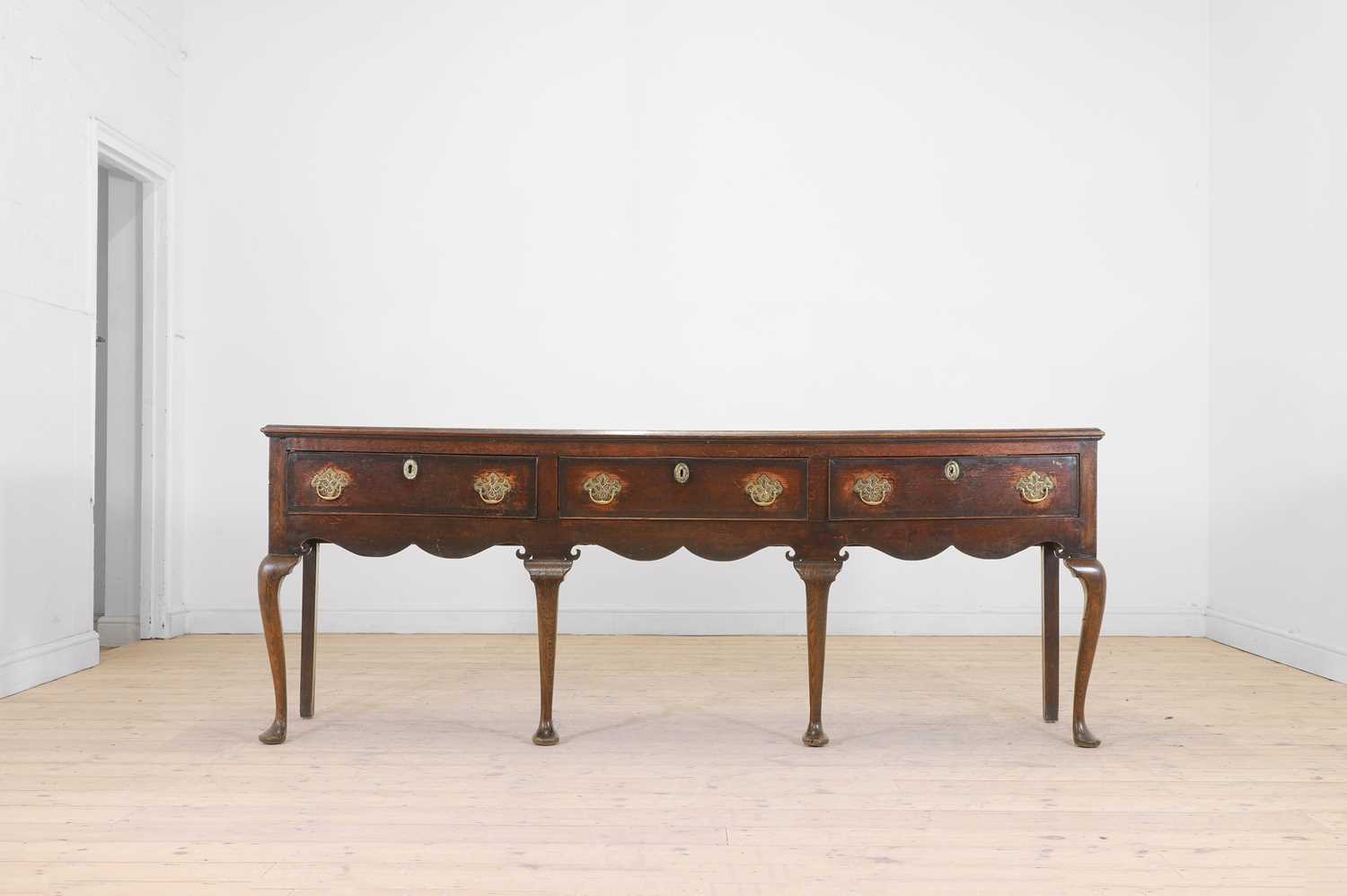 Lot 9 - A George II oak dresser