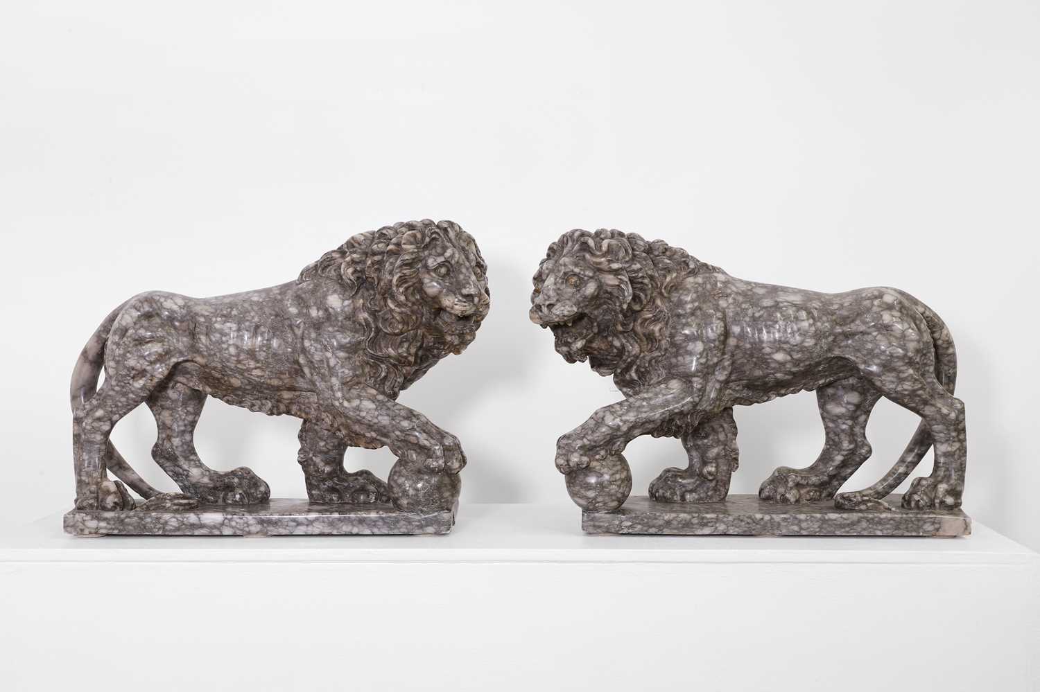 Lot A pair of marble Medici lions