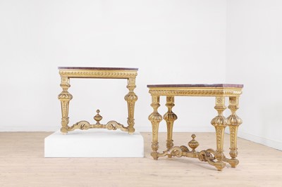 Lot A pair of Louis XIV-style giltwood console tables