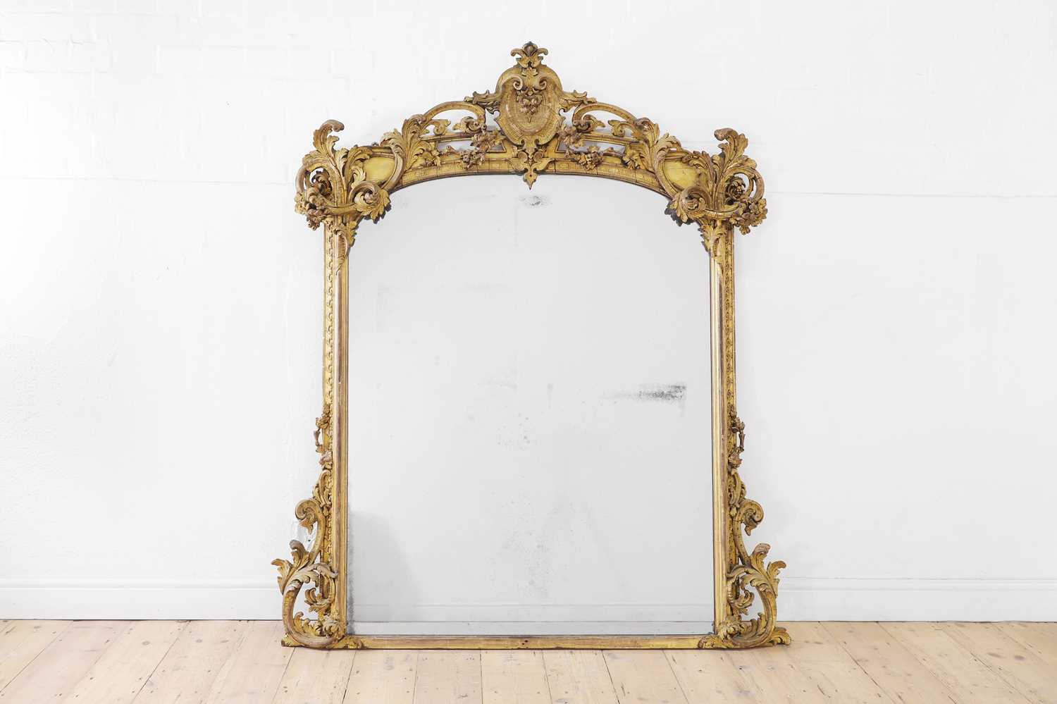 Lot 22 - A Louis XV-style painted and parcel-gilt wood and composition overmantel mirror