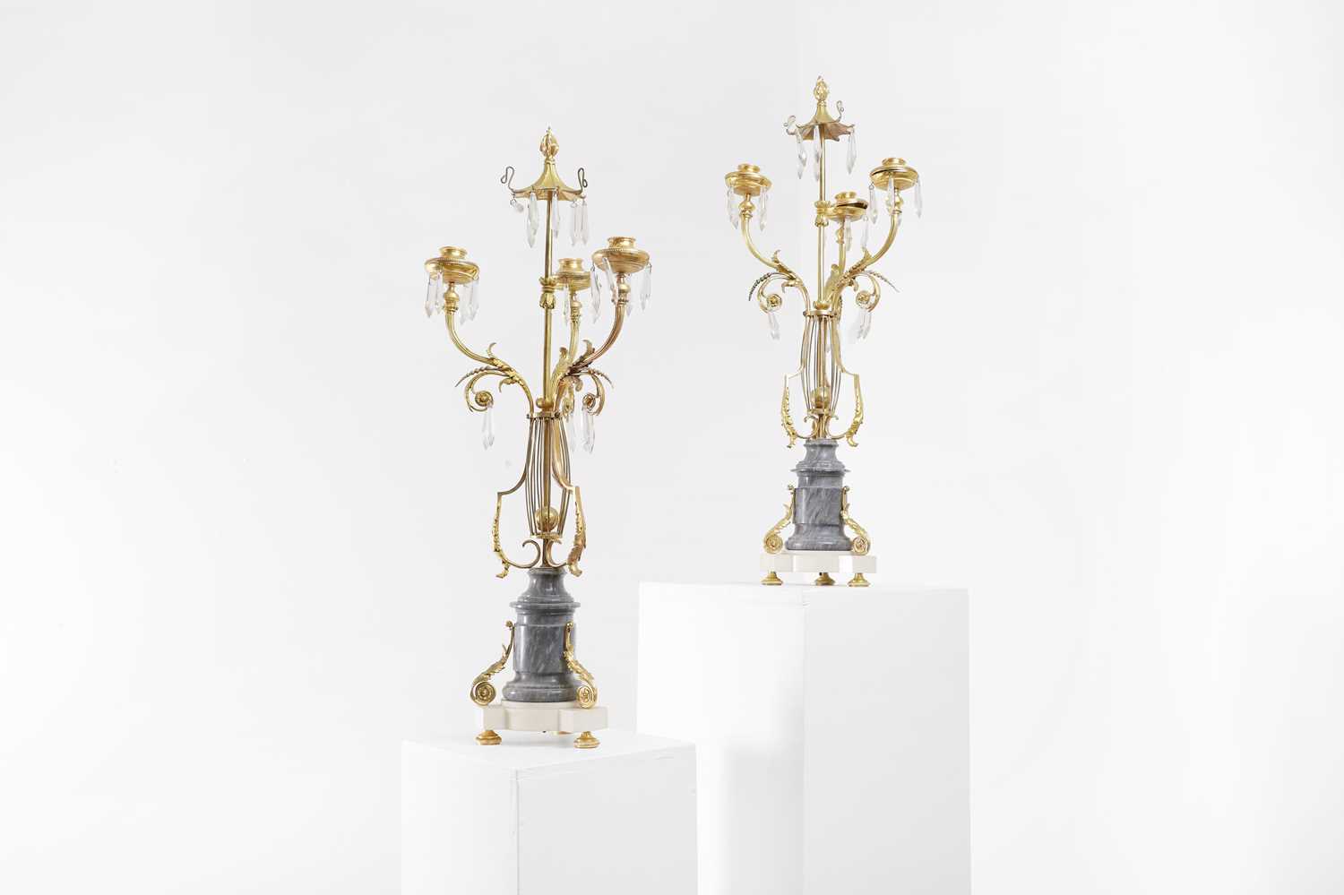 Lot 23 - A pair of ormolu and marble candelabra