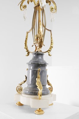 Lot 23 - A pair of ormolu and marble candelabra