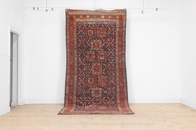 Lot 54 - A Kazak wool rug