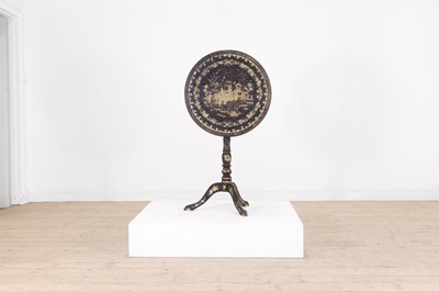 Lot 37 - An export black-lacquered chinoiserie tripod table