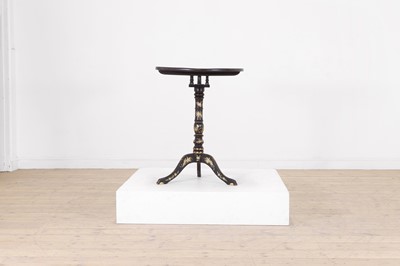 Lot 37 - An export black-lacquered chinoiserie tripod table