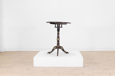 Lot 37 - An export black-lacquered chinoiserie tripod table