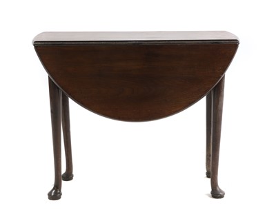 Lot 726 - A George III mahogany drop flap table