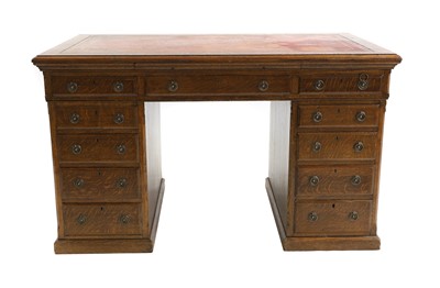 Lot 706 - An Edwardian oak partners pedestal desk