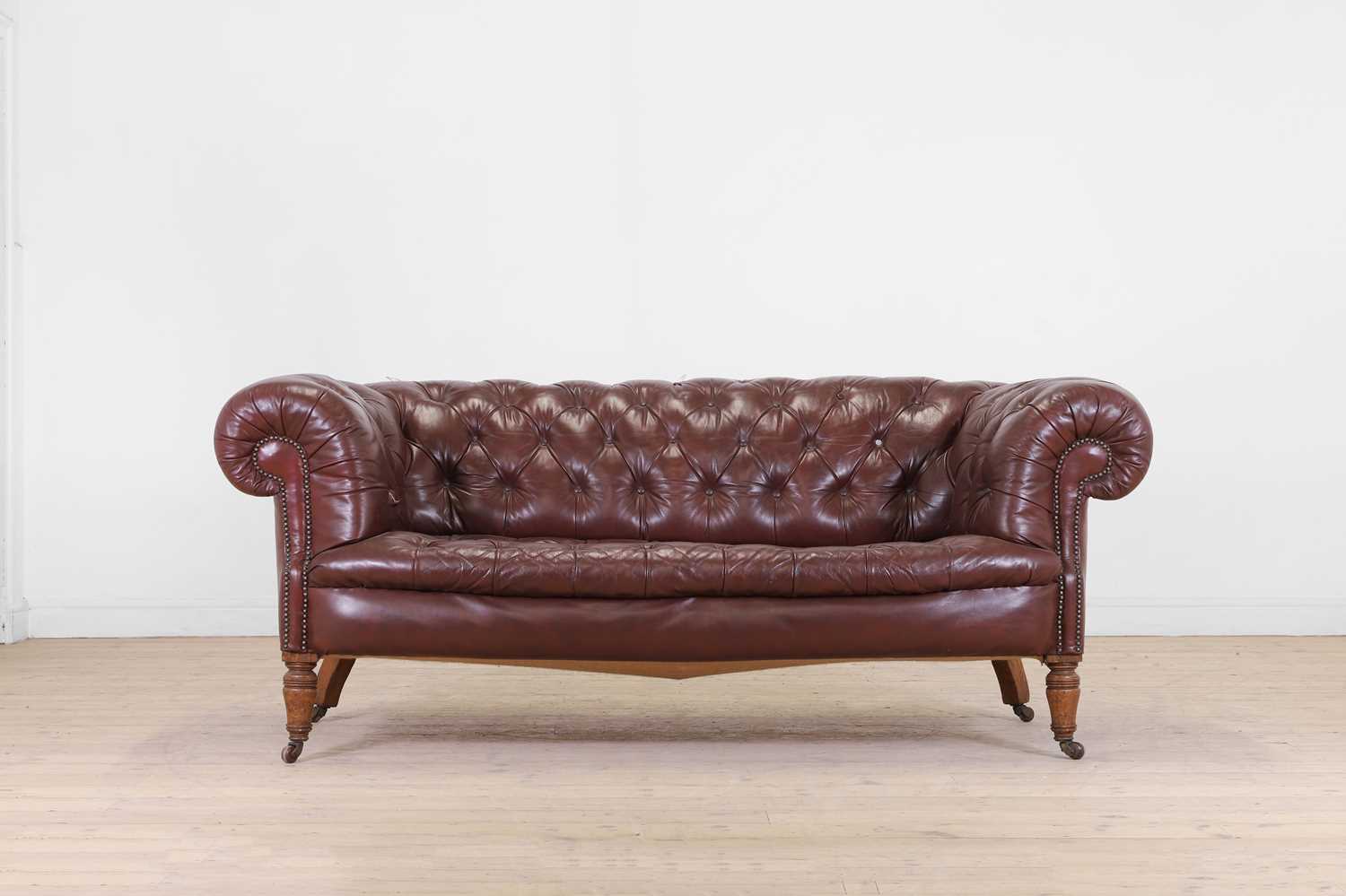 Lot 42 - A Victorian buttoned leather chesterfield sofa