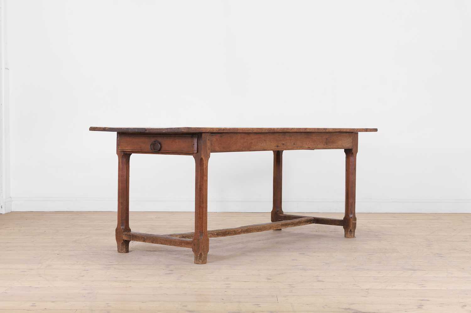 Lot 46 - A fruitwood kitchen table