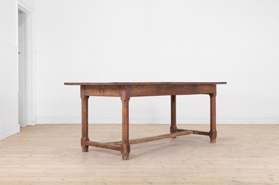 Lot 46 - A fruitwood kitchen table