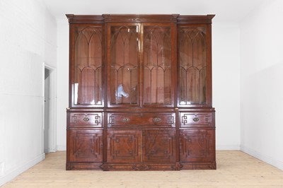 Lot 49 - A George III oak housekeeper’s cabinet