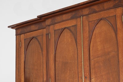 Lot 49 - A George III oak housekeeper’s cabinet