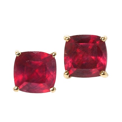 Lot 1177 - A pair of fracture filled ruby studs