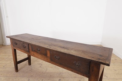 Lot 50 - A chestnut dresser base