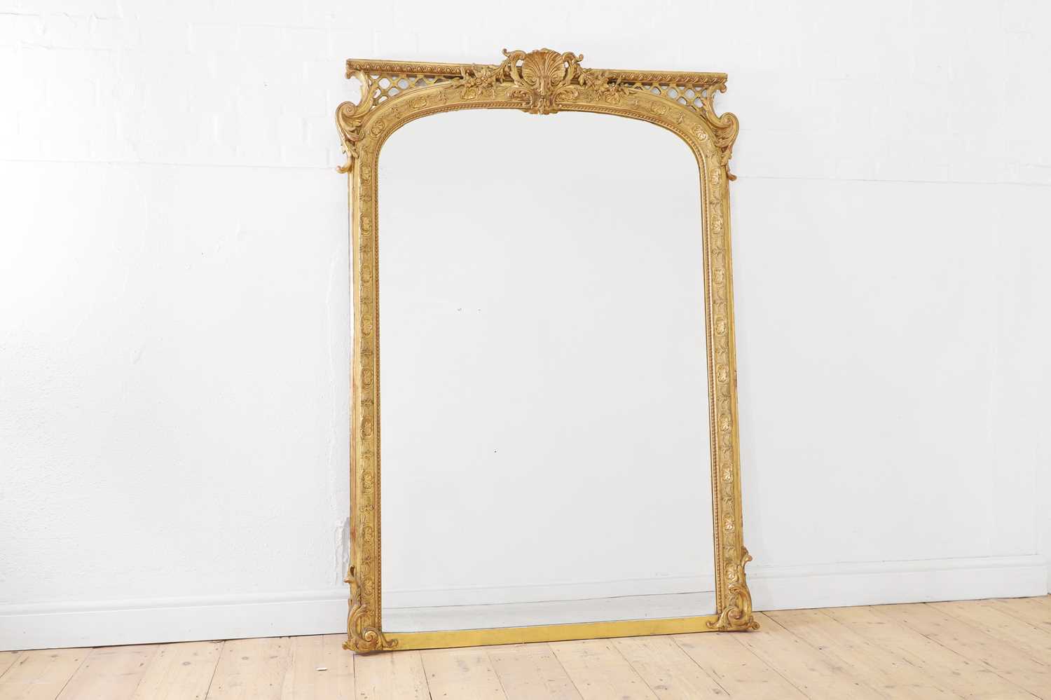 Lot 48 - A Louis XV-style giltwood and gesso overmantel mirror