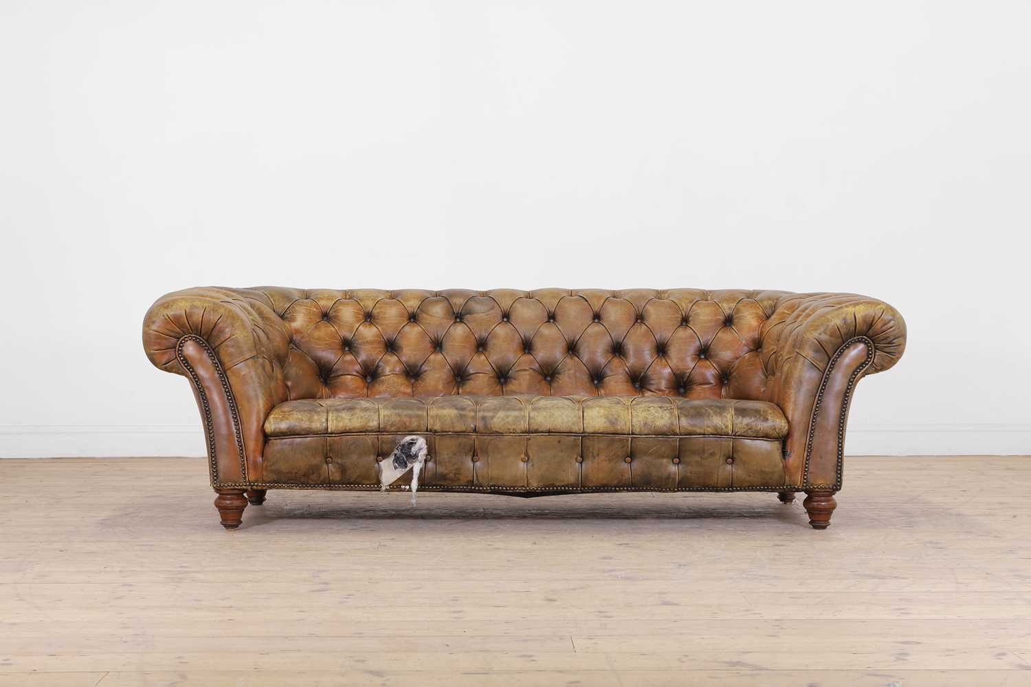 Lot 51 - A Victorian buttoned leather chesterfield sofa