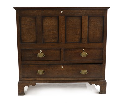 Lot 407 - A George III oak mule chest