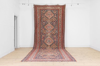 Lot 57 - A Persian tribal wool runner