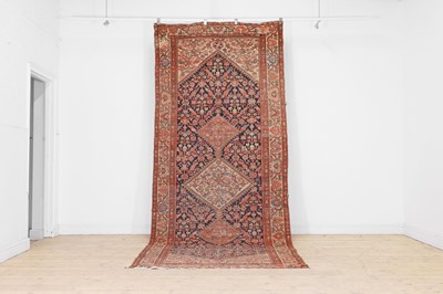 Lot 26 - A Persian tribal wool runner