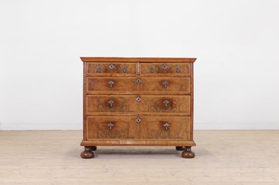 Lot 62 - A walnut chest of drawers