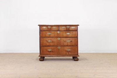 Lot 59 - A walnut chest of drawers