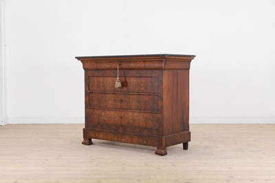 Lot 52 - A Louis Philippe figured walnut commode