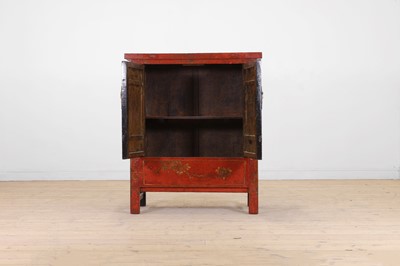 Lot 64 - A red-lacquered wooden cabinet