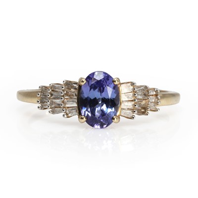 Lot 1239 - A tanzanite and diamond ballerina style ring