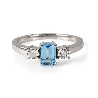 Lot 1164 - A white gold blue topaz and diamond ring