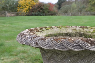 Lot 67 - A large reconstituted stone garden urn