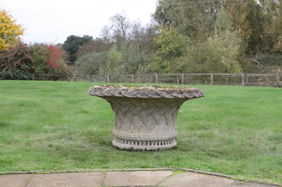 Lot 67 - A large reconstituted stone garden urn