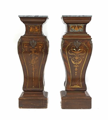 Lot 667 - A near pair of neoclassical mahogany pedestals