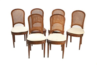 Lot 439 - A set of five French Empire style walnut veneered dining chairs