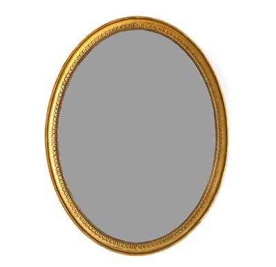 Lot 437 - A large Regency style oval gilt mirror