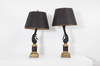 Lot 540 - A pair of Empire patinated bronze and ormolu table lamps