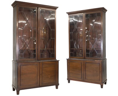 Lot 441 - A pair of George III style mahogany bookcases