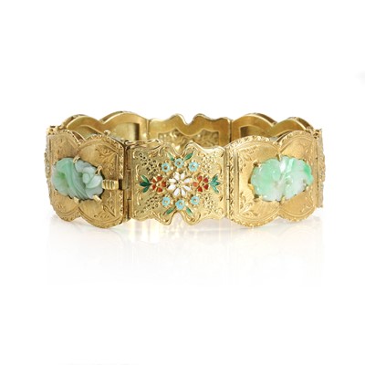 Lot 94 - A carved jade and enamel panel bracelet