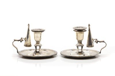 Lot 20 - A pair of Irish silver chambersticks