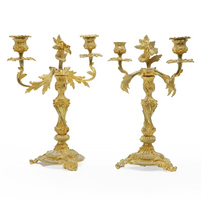 Lot 310 - A pair of Louis XV style gilt metal candelabra