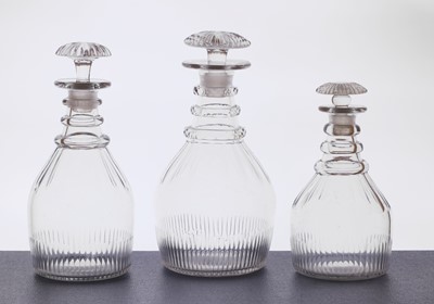 Lot 230 - Three cut glass decanters