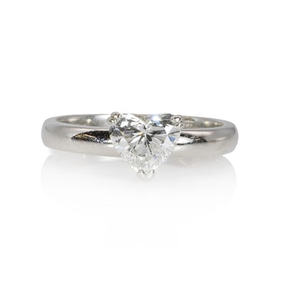 Lot 272 - A platinum and heart shaped diamond single stone ring