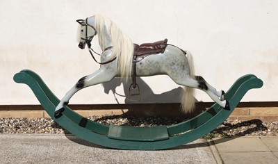 Lot 638 - A dapple grey painted rocking horse