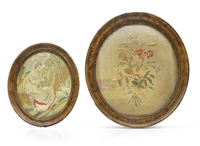 Lot 487 - Two oval silk work samplers