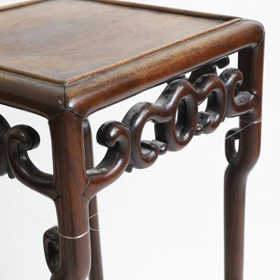 Lot 439 - A Chinese hardwood vase stand