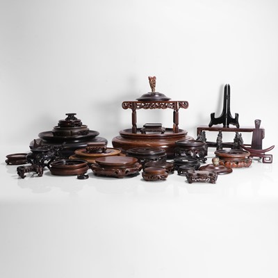 Lot 468 - A collection of Chinese wood stands